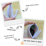 Light blue silicone treat pouch with strap, shown with squeeze-open design panels.