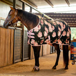 Black fleece horse blanket with pink rose floral print and light pink trim