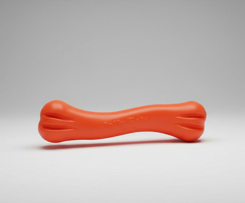 Jolly Bone floating dog toy, small/medium/large—orange rubber bone shape