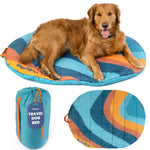Teal and orange striped travel dog bed with carry pouch and oval base