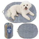 Light gray travel dog bed with rounded cushion and matching carry pouch