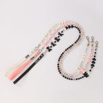 Pet pearl leash with bow and heart charms, pink and black straps