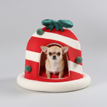 Christmas candy hut pet bed with red and white striped tunnel, small dog peeking inside