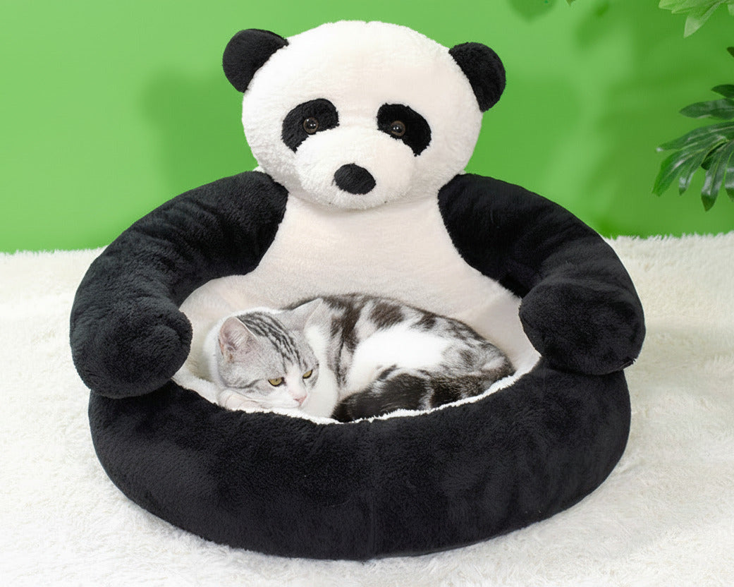 Panda plush pet bed with raised cushion and sleeping kitten inside