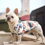 Hawaiian pet shirt in white with multicolor tropical leaf print