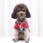 Hawaiian pet shirt in red with colorful tropical leaf and pineapple print