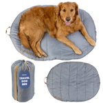 Blue foldable round dog bed with carry bag, cushioned bolster with zipper opening