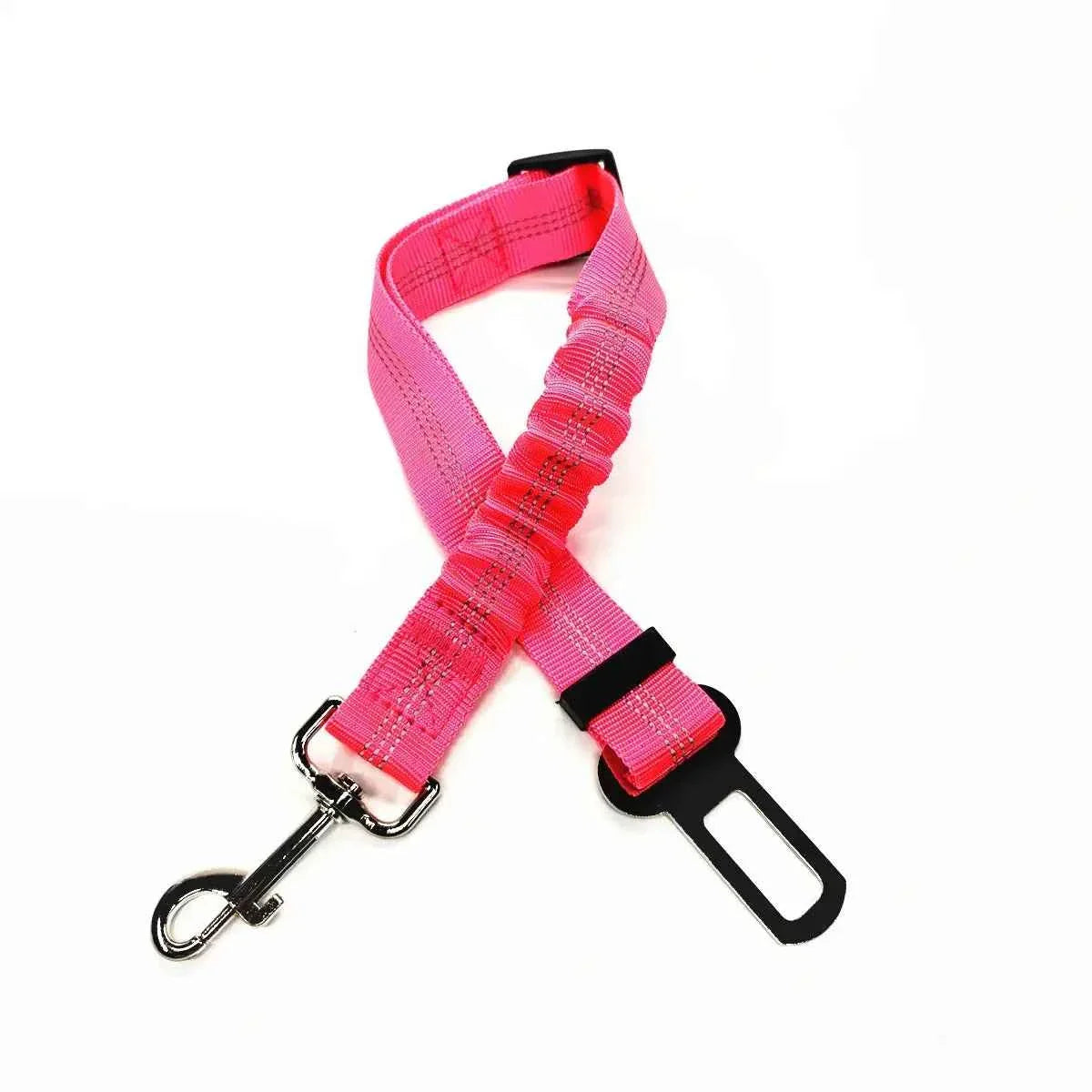 Pink pet car safety belt harness with adjustable clip and metal D-ring.