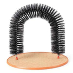 Black bristle cat arch self-groomer with tan scratching base and red corner pegs