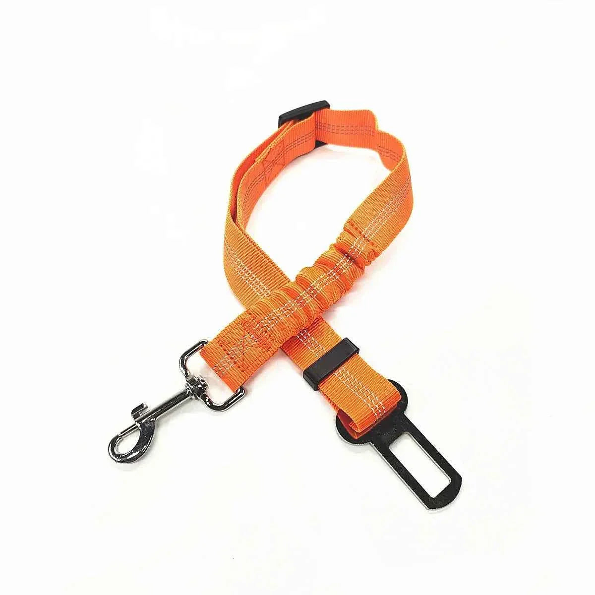 Orange pet car safety belt harness with adjustable clip and metal D-ring.