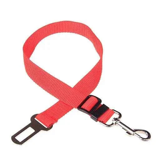 Pet car seat belt harness in red fabric with black buckle and metal safety hook