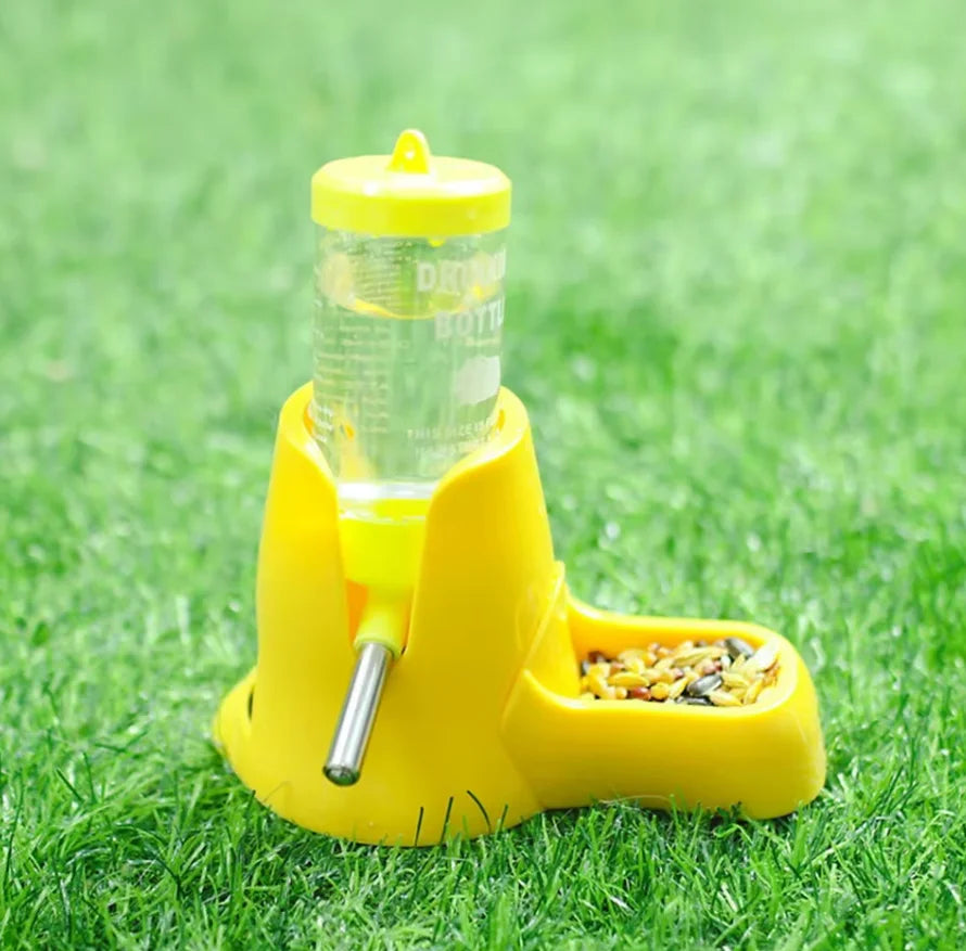 Yellow automatic pet water bottle feeder dispenser with bowl filled with dry food