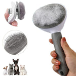 Pet hair remover brush with oval pin head in gray and white, grippy gray handle