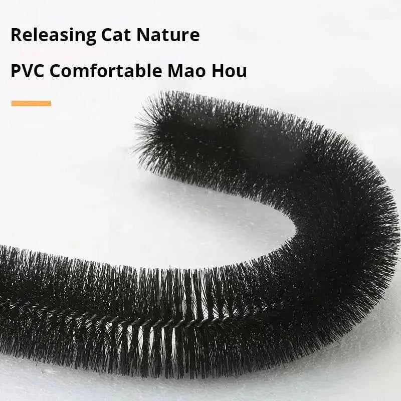 Curved black bristle grooming arch over tan scratching pad