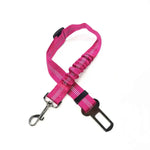 Pet car seat belt harness in pink fabric with metal hook and black buckle