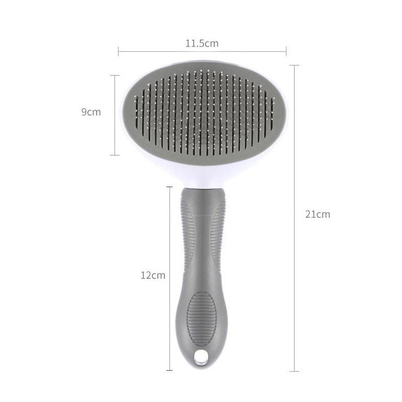 Gray pet hair remover brush with oval bristle head and textured grip handle