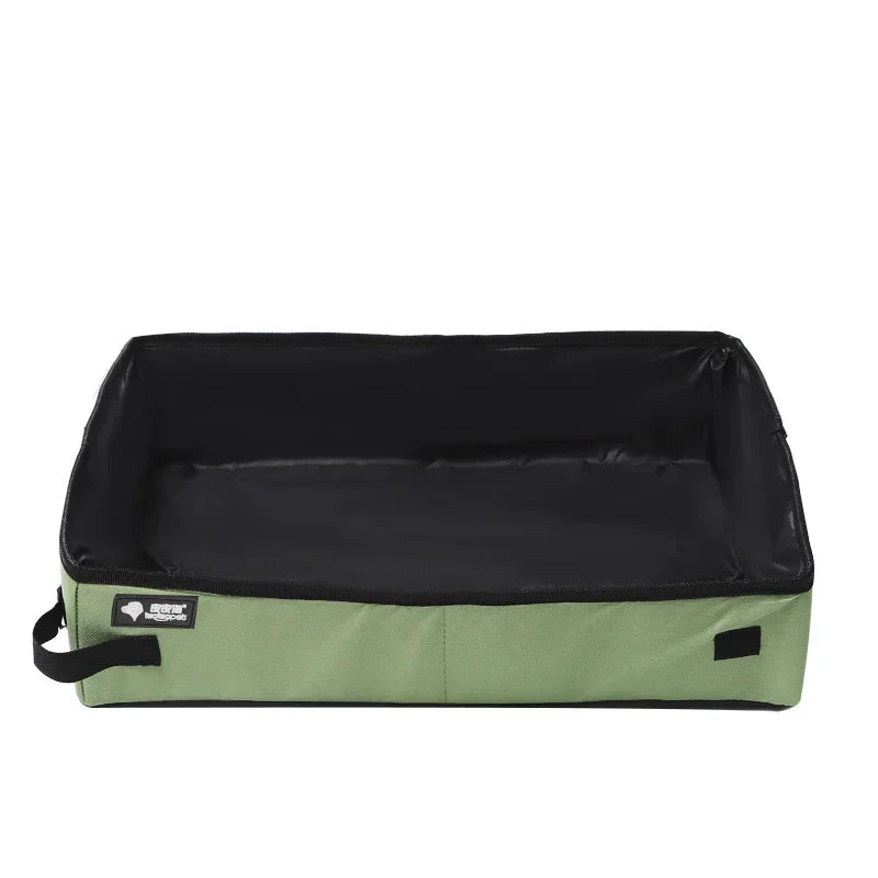 Portable folding pet litter box with green fabric sides and dark waterproof top liner