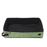 Portable folding pet litter box with green fabric sides and dark waterproof top liner