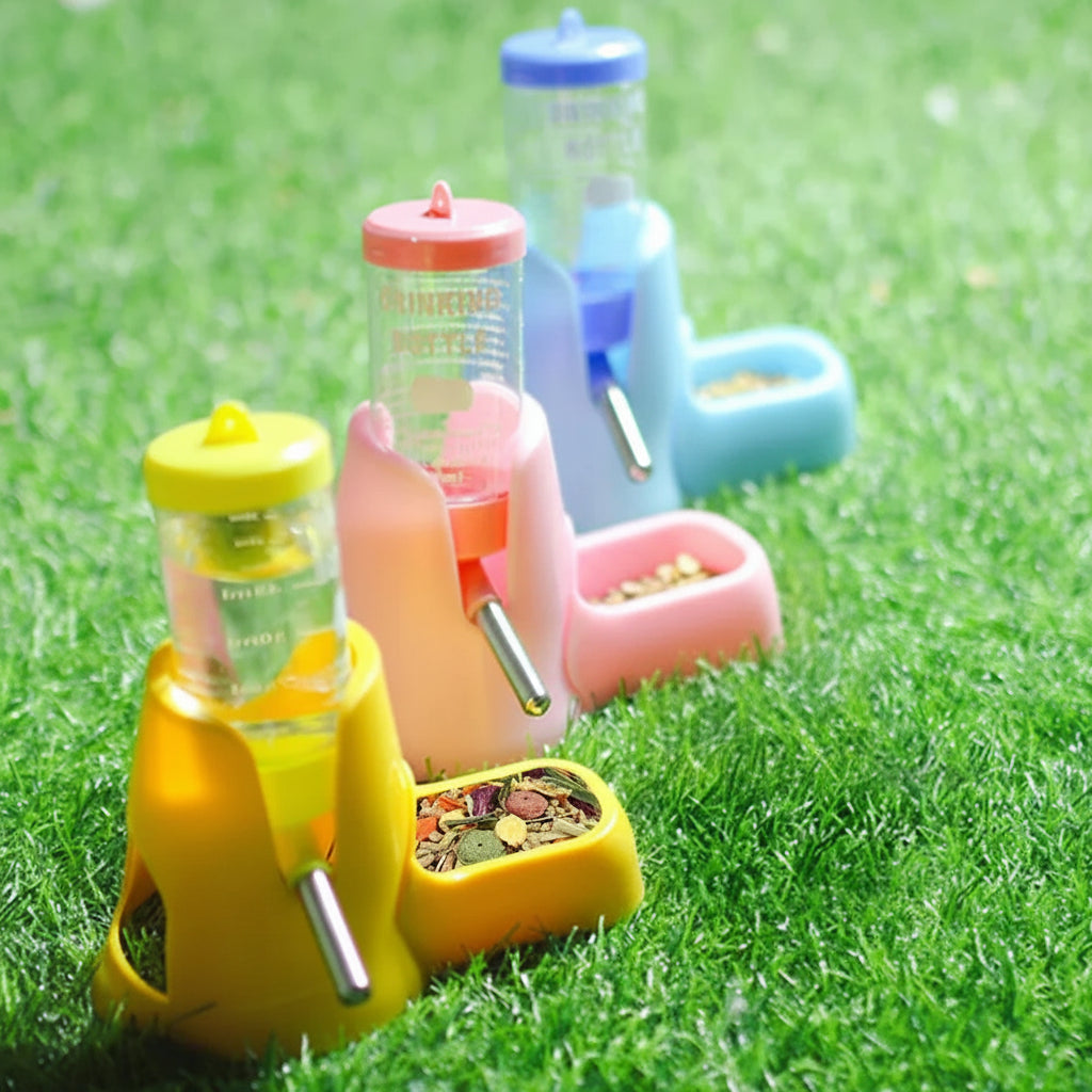 Colorful automatic pet water bottle feeder dispenser set with small hamster on grass