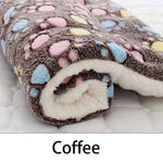 Coffee-brown flannel pet sleeping mat with colorful paw-print pattern and cream lining