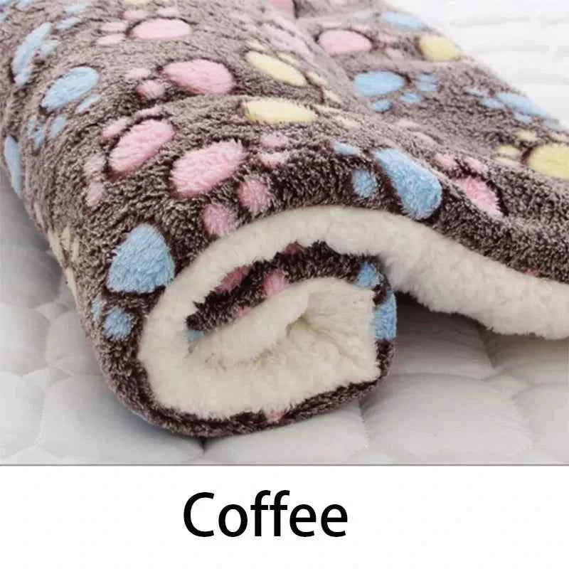 Coffee-brown flannel pet sleeping mat with colorful paw-print pattern and cream lining