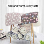 Flannel pet sleeping mat, pink and dark blue folded rolls with plush star-and-foot designs