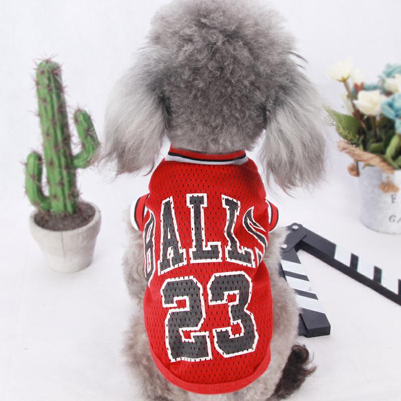 Red mesh basketball pet jersey with “BALLS 23” front number and striped collar