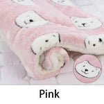 Pink flannel pet sleeping mat, close-up of plush rolled edge with cute animal patches