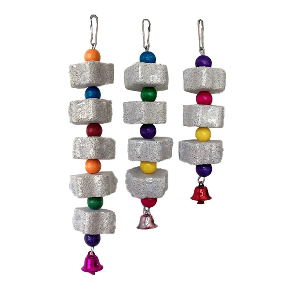 Hanging volcanic rock chew toy with stacked cubes, colorful beads, and metal bell charms