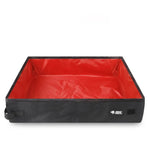 Portable folding pet litter box with dark fabric sides and red waterproof liner