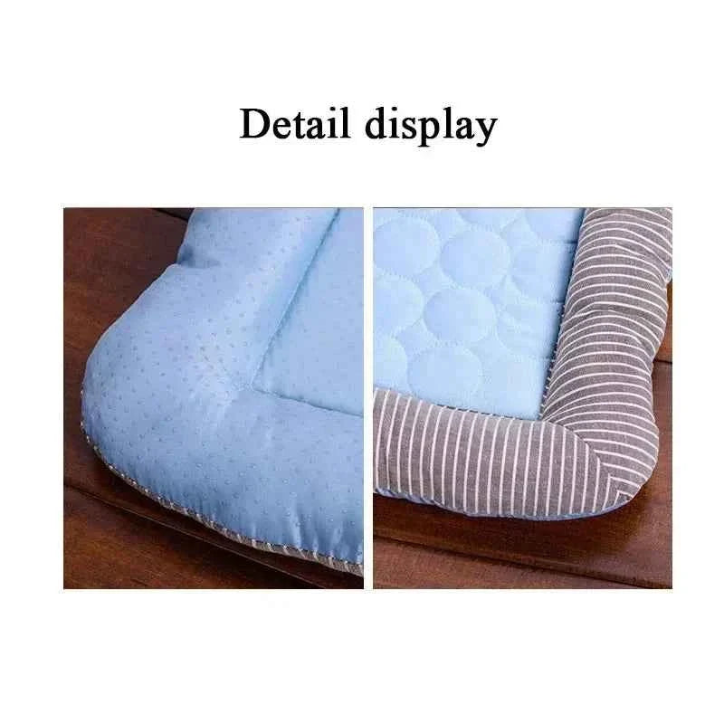 Pet cooling mat corner detail with light blue bubble-texture pad and gray stripes