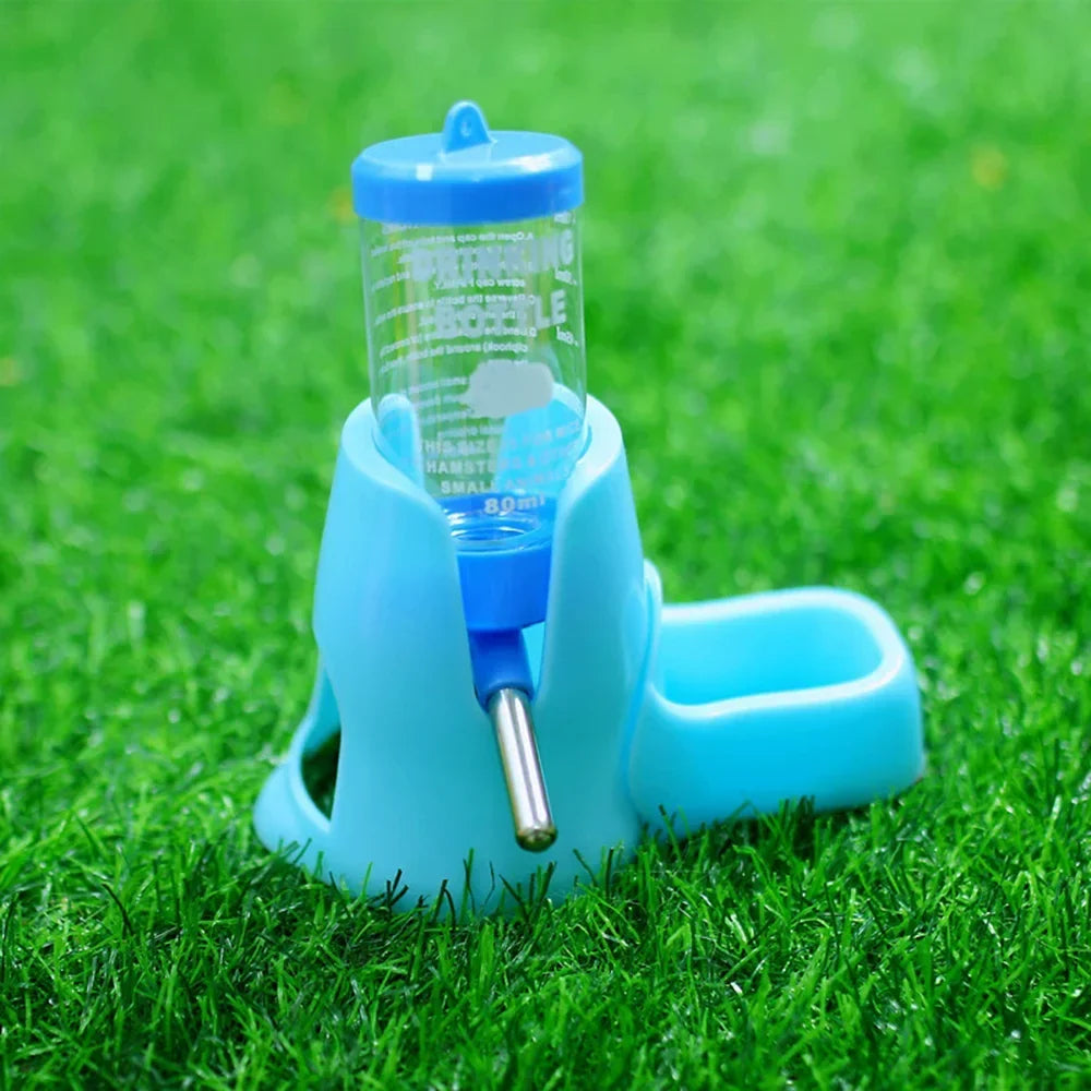 Blue automatic pet water bottle feeder dispenser with clear bottle and metal drinking tube