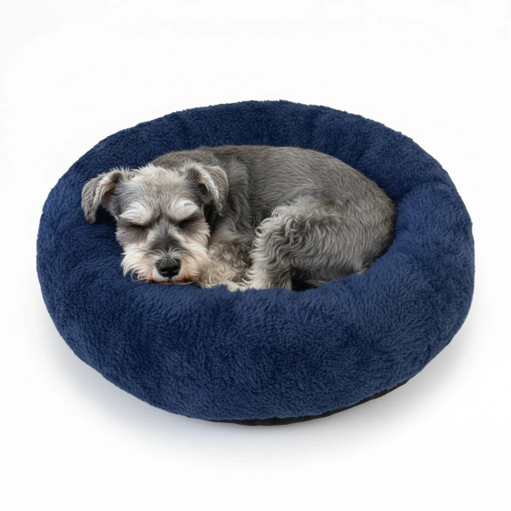 Plush round donut pet bed, navy shag cushion with sleeping dog