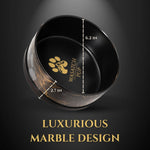 Black ceramic pet bowl with gold marble pattern and interior paw logo, size-marked