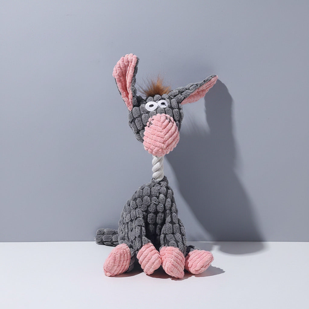 Plush squeaky bunny dog toy in dark gray with pink ears and light pink belly.