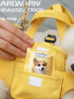 Yellow portable pet carrier harness with metal keyring clip and front label pocket