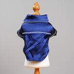Blue satin pet pajama jacket back view with white piping and short sleeves