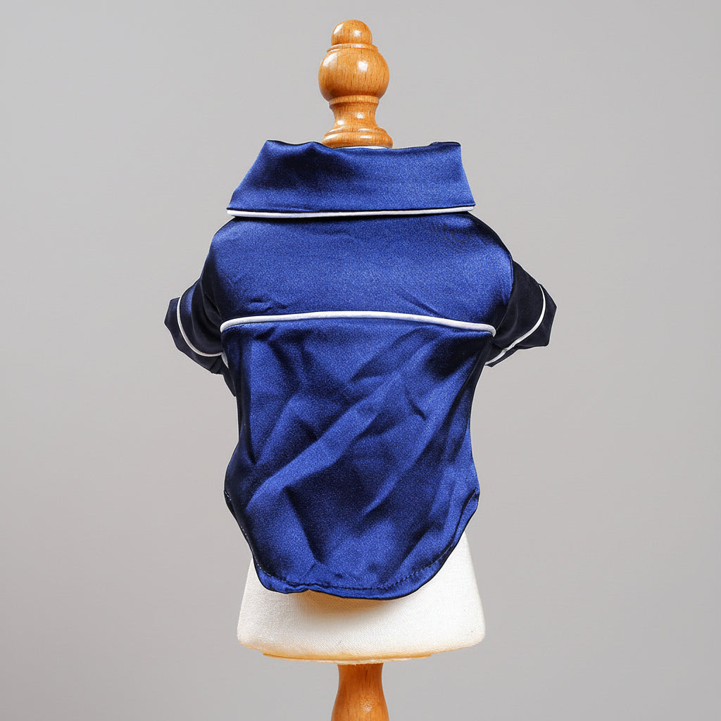 Blue satin pet pajama jacket back view with white piping and short sleeves