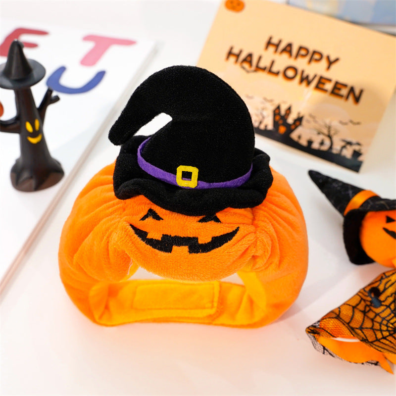 Orange pumpkin pet costume hood with black witch hat and jack-o-lantern face