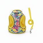 Yellow camouflage dog harness with reflective piping and matching leash