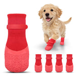 Red anti-slip dog socks with textured non-slip sole pattern and elastic cuffs.
