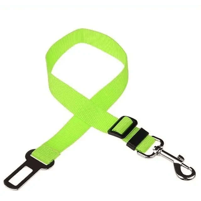 Adjustable pet car seat belt with lime green strap and black adjuster buckle