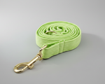 Apple green corduroy leash with gold-tone clip and swivel hook
