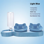 Light blue pet feeding station with auto water dispenser and two raised food bowls