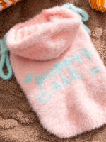 Pink knitted pet sweater with mint-blue star knit pattern and hooded style
