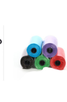 Pack of rolled pet waste bags in blue, purple, pink, black, green, and red