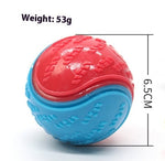Dog training ball toy with red and blue textured shell, 6.5 cm height shown