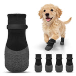 Black anti-slip dog socks with textured non-slip sole pattern and elastic cuffs.