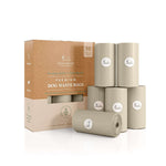 Compostable dog waste bags in tan box with multiple light beige refill rolls