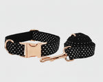 Black polka-dot collar plus detachable leash; rose-gold buckle and clip hardware